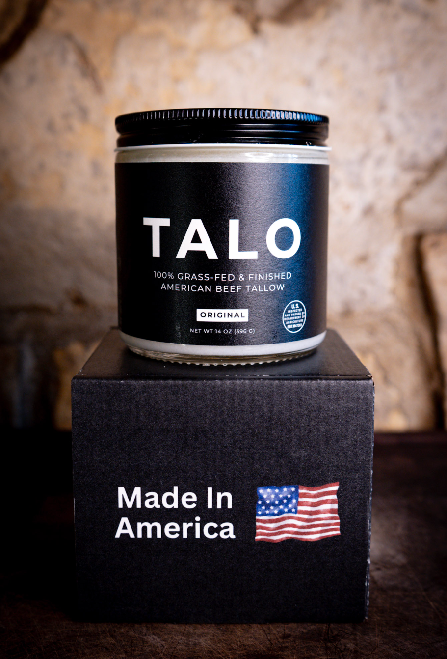 TALO beef tallow jar on top of a Made in America shipping box